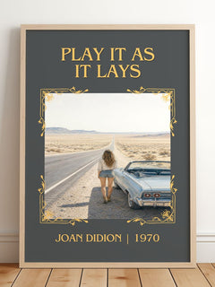 Play It as It Lays Classic Book Art Print by Joan Didion – framed print leaning on a wooden floor
