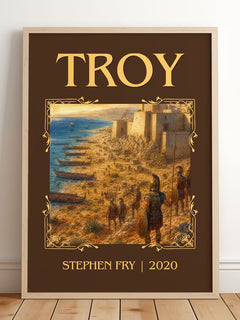 Troy Classic Book Art Print by Stephen Fry – framed print leaning on a wooden floor
