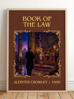 Book of the Law Classic Book Art Print by Aleister Crowley – framed print leaning on a wooden floor