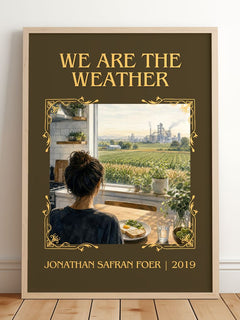 We are the weather Classic Book Art Print by Jonathan Safran Foer – framed print leaning on a wooden floor
