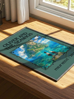 Oliver And The Seawigs Classic Book Art Print by Philip Reeve – print on a sunlit desk