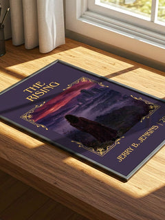 The Rising Classic Book Art Print by Jerry B. Jenkins – print on a sunlit desk