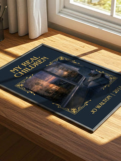 My real children Classic Book Art Print by Jo Walton – print on a sunlit desk