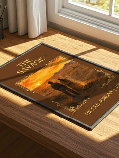 The Savage Classic Book Art Print by Nicole Jordan – print on a sunlit desk