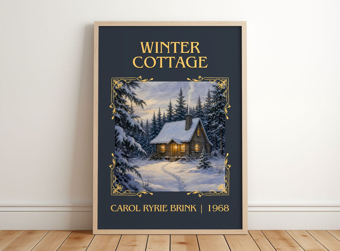 Winter Cottage Classic Book Art Print by Carol Ryrie Brink – framed print leaning on a wooden floor