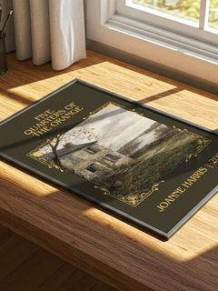 Five quarters of the orange Classic Book Art Print by Joanne Harris – print on a sunlit desk
