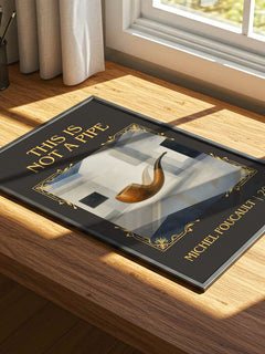 This Is Not a Pipe Classic Book Art Print by Michel Foucault – print on a sunlit desk