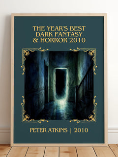 The Year's Best Dark Fantasy & Horror 2010 Classic Book Art Print by Peter Atkins – framed print leaning on a wooden floor