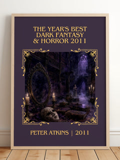 The Year's Best Dark Fantasy & Horror 2011 Classic Book Art Print by Peter Atkins – framed print leaning on a wooden floor