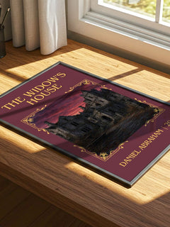 The widow's house Classic Book Art Print by Daniel Abraham – print on a sunlit desk
