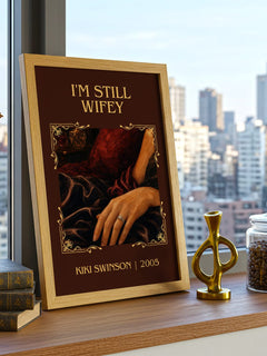 I'm Still Wifey Classic Book Art Print by Kiki Swinson – framed print on a city-view windowsill