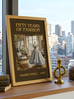 Fifty years of fashion Classic Book Art Print by Valerie Steele – framed print on a city-view windowsill