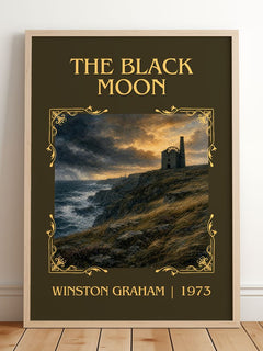 The black moon Classic Book Art Print by Winston Graham – framed print leaning on a wooden floor