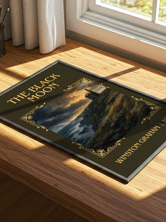 The black moon Classic Book Art Print by Winston Graham – print on a sunlit desk