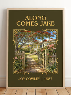 Along comes Jake Classic Book Art Print by Joy Cowley – framed print leaning on a wooden floor