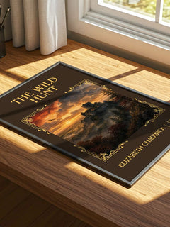 The wild hunt Classic Book Art Print by Elizabeth Chadwick – print on a sunlit desk