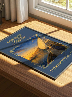 Crocodile on the sandbank Classic Book Art Print by Elizabeth Peters – print on a sunlit desk