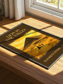 Lion in the valley Classic Book Art Print by Elizabeth Peters – print on a sunlit desk