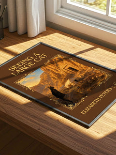 Seeing a large cat Classic Book Art Print by Elizabeth Peters – print on a sunlit desk