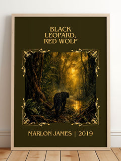 Black Leopard, Red Wolf Classic Book Art Print by Marlon James – framed print leaning on a wooden floor