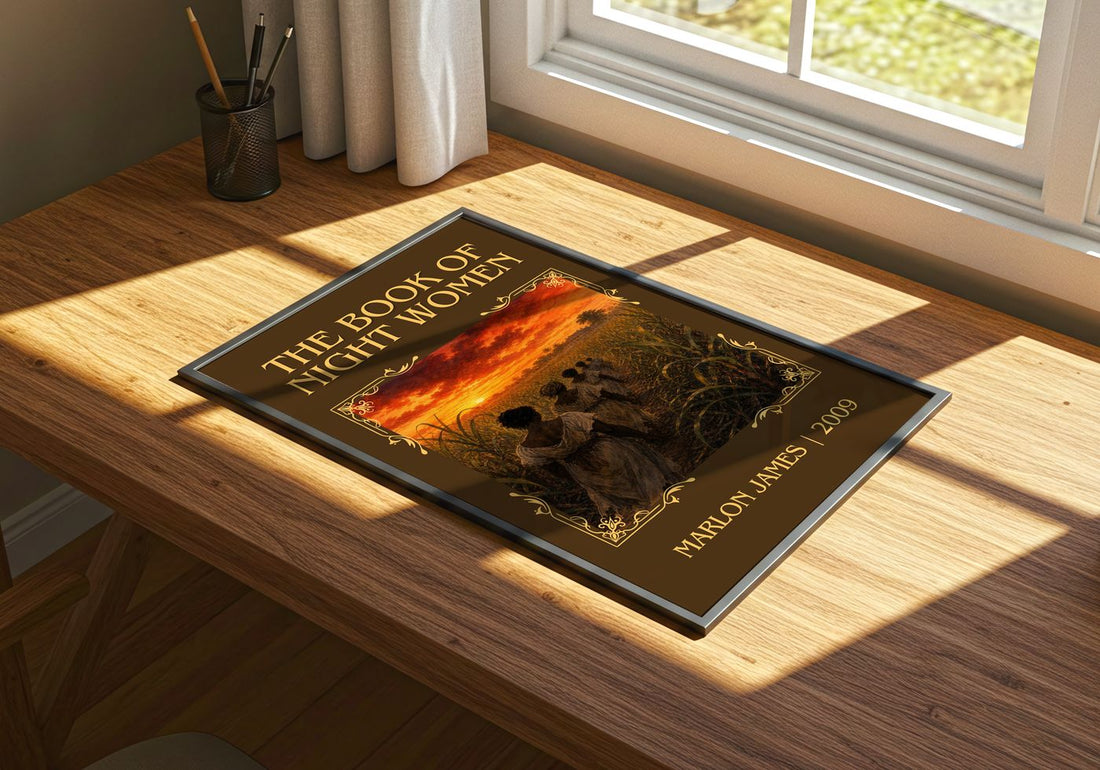 The book of night women Classic Book Art Print by Marlon James – print on a sunlit desk