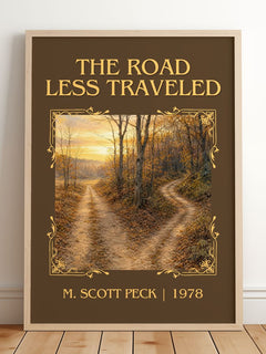 The Road Less Traveled Classic Book Art Print by M. Scott Peck – framed print leaning on a wooden floor