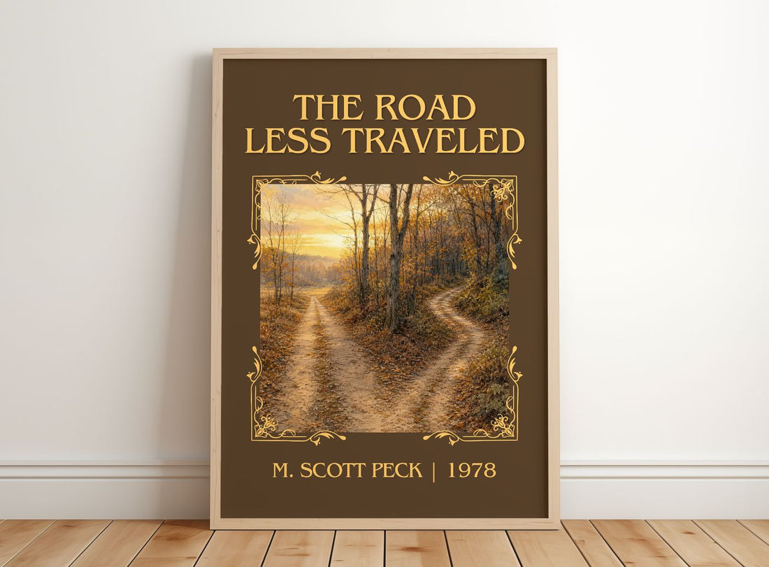 The Road Less Traveled Classic Book Art Print by M. Scott Peck – framed print leaning on a wooden floor