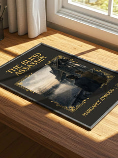 The Blind Assassin Classic Book Art Print by Margaret Atwood – print on a sunlit desk