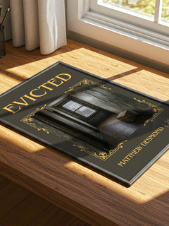 Evicted Classic Book Art Print by Matthew Desmond – print on a sunlit desk