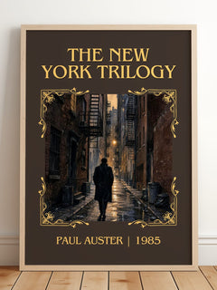 The New York Trilogy Classic Book Art Print by Paul Auster – framed print leaning on a wooden floor