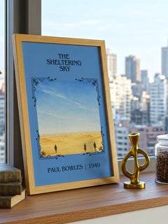 The Sheltering Sky Classic Book Art Print by Paul Bowles – framed print on a city-view windowsill