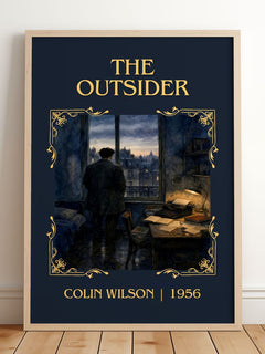 The Outsider Classic Book Art Print by Colin Wilson – framed print leaning on a wooden floor