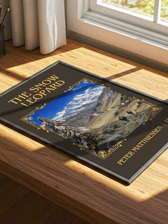 The Snow Leopard Classic Book Art Print by Peter Matthiessen – print on a sunlit desk