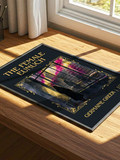 The Female Eunuch Classic Book Art Print by Germaine Greer – print on a sunlit desk