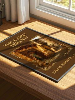 The Cairo Trilogy Classic Book Art Print by Naguib Mahfouz – print on a sunlit desk