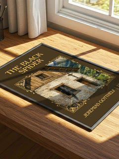 The Black Spider Classic Book Art Print by Jeremias Gotthelf – print on a sunlit desk