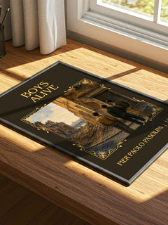 Boys Alive Classic Book Art Print by Pier Paolo Pasolini – print on a sunlit desk