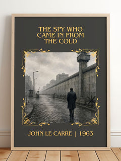 Spy Who Came in From the Cold Classic Book Art Print by John le Carré – framed print leaning on a wooden floor
