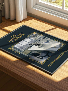 The Elementary Particles Classic Book Art Print by Michel Houellebecq – print on a sunlit desk