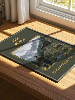 The Wall Classic Book Art Print by Marlen Haushofer – print on a sunlit desk