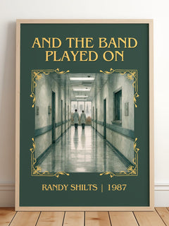 And the Band Played On Classic Book Art Print by Randy Shilts – framed print leaning on a wooden floor