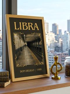 Libra Classic Book Art Print by Don DeLillo – framed print on a city-view windowsill