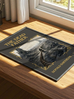The Dead Father Classic Book Art Print by Donald Barthelme – print on a sunlit desk