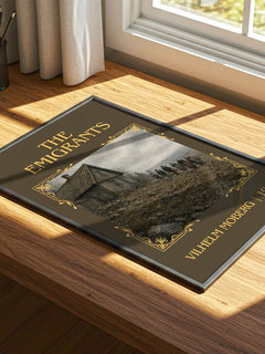 The Emigrants Classic Book Art Print by Vilhelm Moberg – print on a sunlit desk