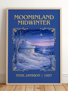 Moominland Midwinter Classic Book Art Print by Tove Jansson – framed print leaning on a wooden floor