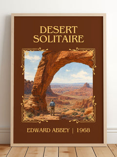 Desert Solitaire Classic Book Art Print by Edward Abbey – framed print leaning on a wooden floor