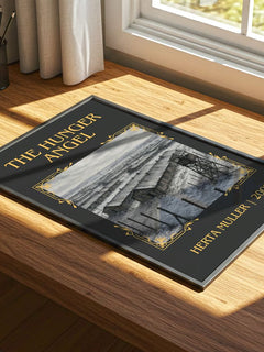 The Hunger Angel Classic Book Art Print by Herta Müller – print on a sunlit desk
