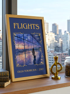 Flights Classic Book Art Print by Olga Tokarczuk – framed print on a city-view windowsill