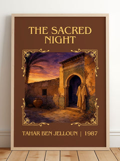 The Sacred Night Classic Book Art Print by Tahar Ben Jelloun – framed print leaning on a wooden floor
