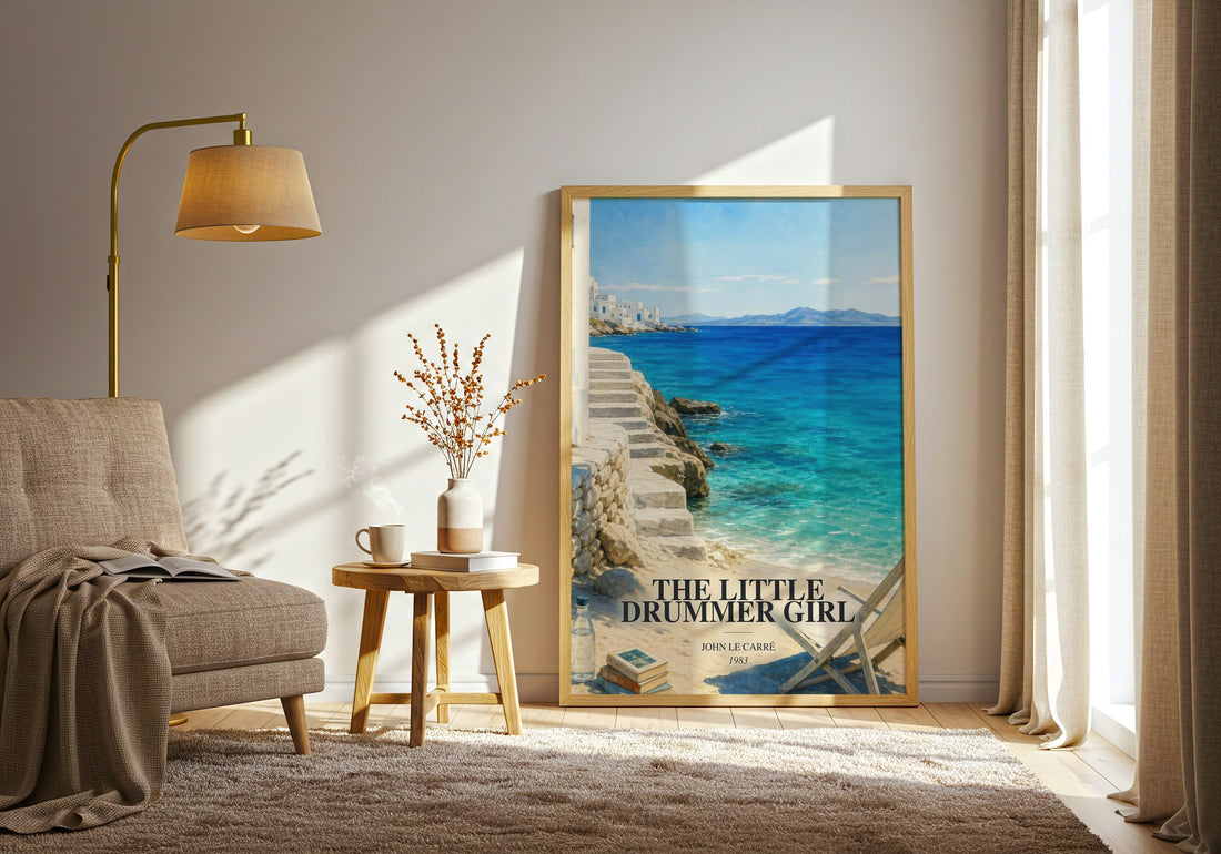 The Little Drummer Girl watercolour print in frame leaning in hallway – thriller wall art (mockup)